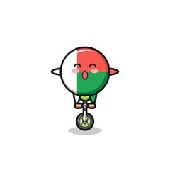 Poster - The cute madagascar flag character is riding a circus bike