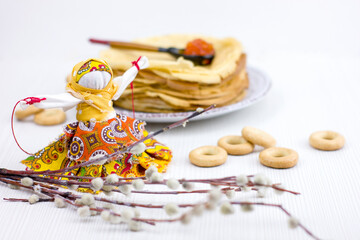 Wall Mural - Background with pancakes, textile doll, sushki, pussy-willow and spoon with caviar on white for Maslenitsa festival.