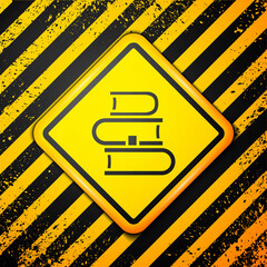 Wall Mural - Black Book icon isolated on yellow background. Warning sign. Vector