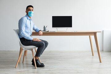 Aufkleber - Arab Worker In Facemask Showing Laptop With Empty Screen, Mockup