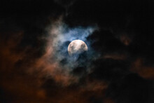 Moon At Night Covered By Clouds Carried By The Wind. Copy Space For Life Quotes And Religion, Greeting Cards And Decorations. 