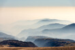 © Alberto Masnovo - Sunny foothills and hills and Padana plain or Po valley with fog, seen from Lessinia plateau (Altopiano della Lessinia), on horizon the mountain range of the Apennines. Erbezzo, Verona, Veneto, Italy.