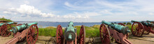 Panoramic View Of Old Historic Canons Pointed To The Ocean And Helsingborg Sweden Seen Accross The Sound
