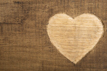 Valentine's Day Greetings Concept. Heart Shape Carved On The Wood. Valentines Greeting Card. Free Space For Your Text