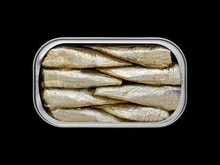 Top view of a tin can with sardines inside on a black background so that it can be silhouetted and the background can be changed.