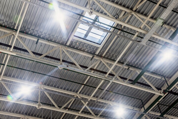 Industrial factory ceiling with ventilation system, ventilation holes