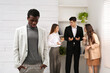 © New Africa - African American man suffering from racial discrimination at work