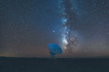 Very Large Array satellite dish under the Milky Way in New Mexico