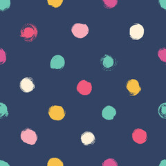 Simple seamless background in polka dots. Hand drawn.