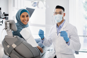 Wall Mural - Root Canal Treatment.. Stomatologist In Medical Mask Having Checkup With Female Patient