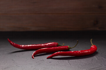 Canvas Print - Chile pepper for homemade cooking at table. Recipe concept in kitchen