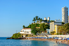 Full Beach In Sunny Day With Calm Sea In Summer Of Salvador City In Bahia, Brazil