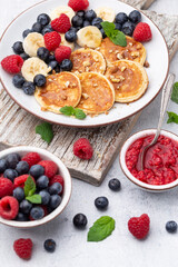 Wall Mural - Keto diet pancakes made or almond flour, served with berries.