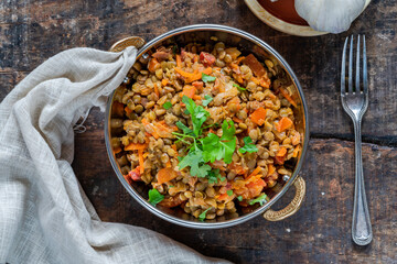 Sticker - Green lentils stew with white wine, Serrano ham and smoked paprika