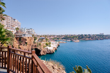 Wall Mural - Landscape with sea marina and buildings on cliff. Antalya Turkey.