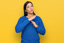 Young Hispanic Woman Wearing Casual Clothes Doing Time Out Gesture With Hands, Frustrated And Serious Face