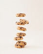 Chocolate chip cookies on the cream background. Sweet food biscuit concept.
