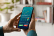 © Thapana_Studio - Businessmen work with stock market investments using smartphone to analyze trading data. smartphone with stock exchange graph on screen. Financial stock market.