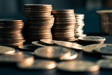 Pile Of Gold Coins Money Stack In Finance Treasury Deposit Bank Account Saving . Concept Of Corporate Business Economy And Financial Growth By Investment In Valuable Asset To Gain Cash Revenue .
