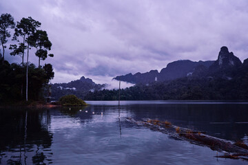 Beautiful landscape with lake, mountains and natural attractions on Cheow Lan Lake at Khao Sok National Park, Surat Thani Province, Thailand.