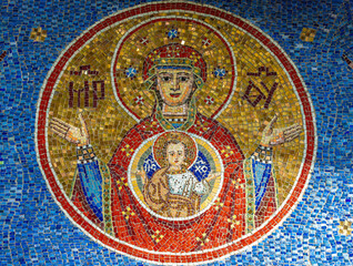 Wall Mural - A mosaic fresco representing the mother of Jesus with the baby at the Tiganesti monastery - Romania