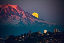 Moon Rising Over Mt Rainier Viewed From Point Ruston In Tacoma Washington