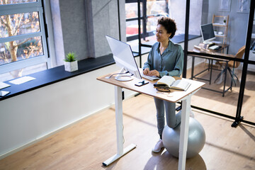 Adjustable Height Desk Stand In Office