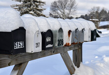 Mailboxes Covered With Fresh Snow Along Rural Road