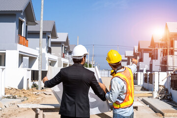Poster - Engineers are discussing data working and blueprint with architectural project at new construction site,Engineering tools and construction concept.