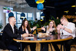 © DSMT - Businessmen are playing Jenga games. They sit in the office and play games. Concept photo for design and work.