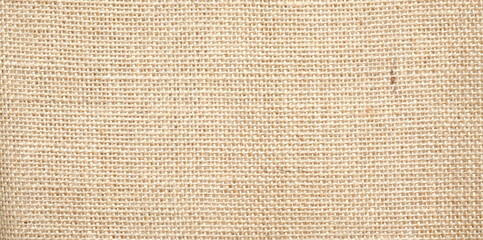 Wall Mural - Hessian sackcloth burlap woven texture background / cotton woven fabric background with flecks of varying colors of beige and brown. with copy space. office desk concept.High Resolution horizontal .	