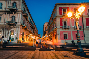 Wall Mural - Long night exposure with people and traffic, city of Taranto