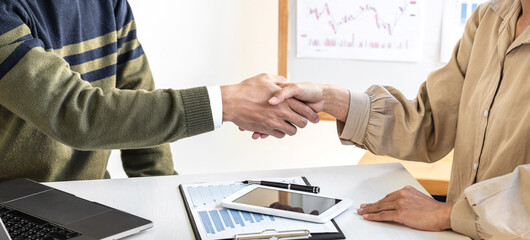 Poster - Teamwork partnership meeting concept, Two confident Business shaking hands after discussing good deal of trading contract and new projects for both companies