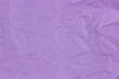 Abstract old wrinkled creased purple color paper texture background