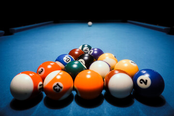 Pool game - balls in triangular shape on a table