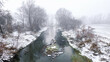 River in winter fog  