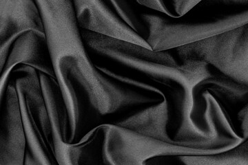 Wall Mural - Black fabric texture background. Smooth elegant black silk texture