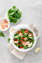 Sticker - Shrimps spinach tomato fresh salad, low carb ketogenic, keto diet. Healthy food. Top view