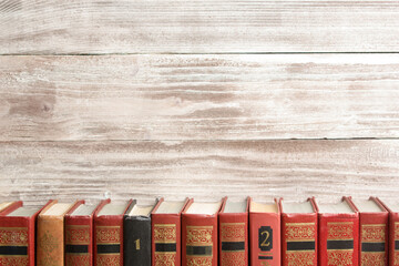 Wall Mural - Old books on a wooden shelf. Back to school