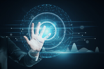 Wall Mural - Close up of businessperson hand pointing at abstract glowing polygonal sphere and digital business interface on blurry blue background. Future, innovation and technology concept. Double exposure.