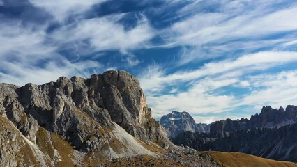 Wall Mural - High mountains and cliffs. Aerial view from a drone. The Dolomite Alps, Italy. Summer landscape in a mountainous region. 