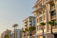Row Of Apartment Buildings With Glass Railings On The Balconies At Oceanside, California