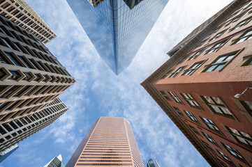 Looking up at skyscrapers in the city of Calgary.