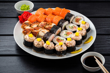 Sticker - Sushi roll set in restaurant served in white plate Japan cuisine