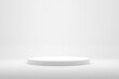 Blank white podium platform or pedestal with white background for product display.
