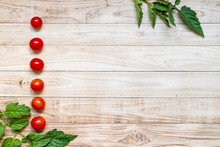 List Cherry Tomatoes On Wooden Table Background
