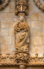 Wall Mural - Sculpture of the Virgin with the Blessing Child above the Entrance of the Convent Church, Convent of Christ, Tomar, Portugal