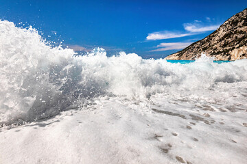 Wall Mural - Waves crashing Ionian sea in Greece.