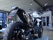© Westend61 - Motorcycle on hydraulic platform at auto repair shop