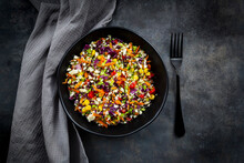 Studio Shot Of Bowl Of Colorful Vegan Salad